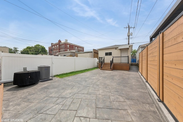1933 W 22nd Pl, Chicago, IL 60608 - fenced backyard featuring a patio area