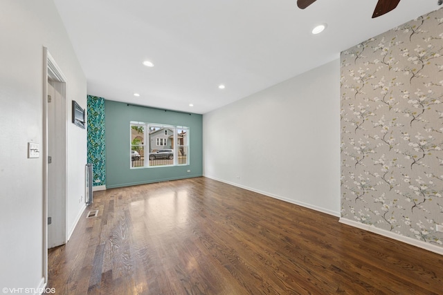 1933 W 22nd Pl, Chicago, IL 60608 - empty room with ceiling fan, wood finished floors, wallpapered walls, and recessed lighting