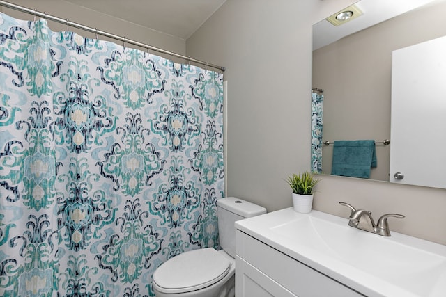 218 Deerpath Ct Unit B2, Schaumburg, IL 60193 - bathroom with vanity, toilet, and a shower with curtain