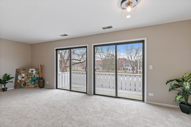 218 Deerpath Ct Unit B2, Schaumburg, IL 60193 - empty room featuring carpet and baseboards