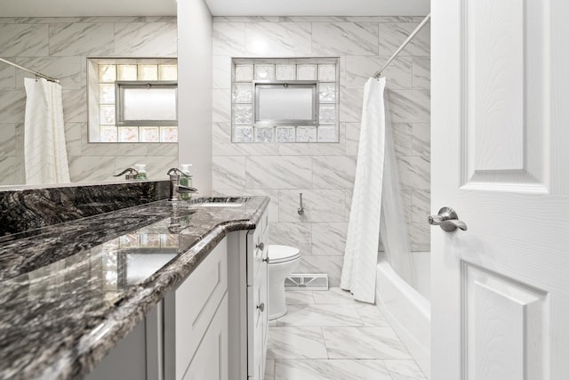 5708 W 82nd Pl, Burbank, IL 60459 - full bathroom featuring double vanity, toilet, shower / tub combo with curtain, marble look tiles, and tile walls