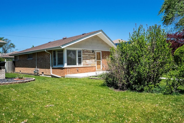 5708 W 82nd Pl, Burbank, IL 60459 - view of home's exterior featuring brick siding and a lawn