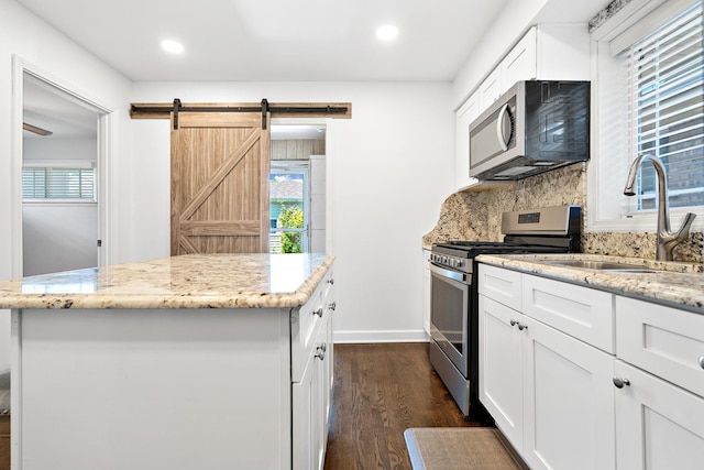 5708 W 82nd Pl, Burbank, IL 60459 - kitchen with stainless steel appliances, a sink, healthy amount of natural light, backsplash, and recessed lighting
