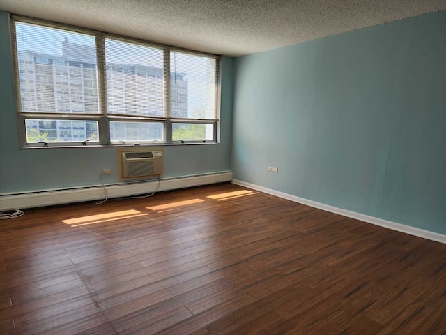 8815 W Golf Rd Unit 6B, Niles, IL 60714 - empty room featuring a textured ceiling, dark wood-style floors, baseboards, and a baseboard heating unit