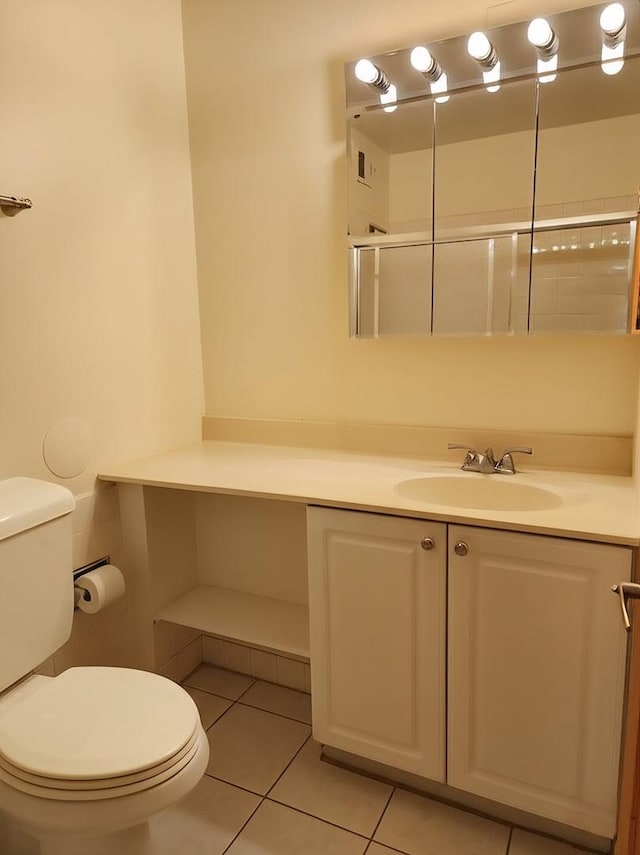 8815 W Golf Rd Unit 6B, Niles, IL 60714 - full bathroom featuring toilet, vanity, tile patterned floors, and a shower