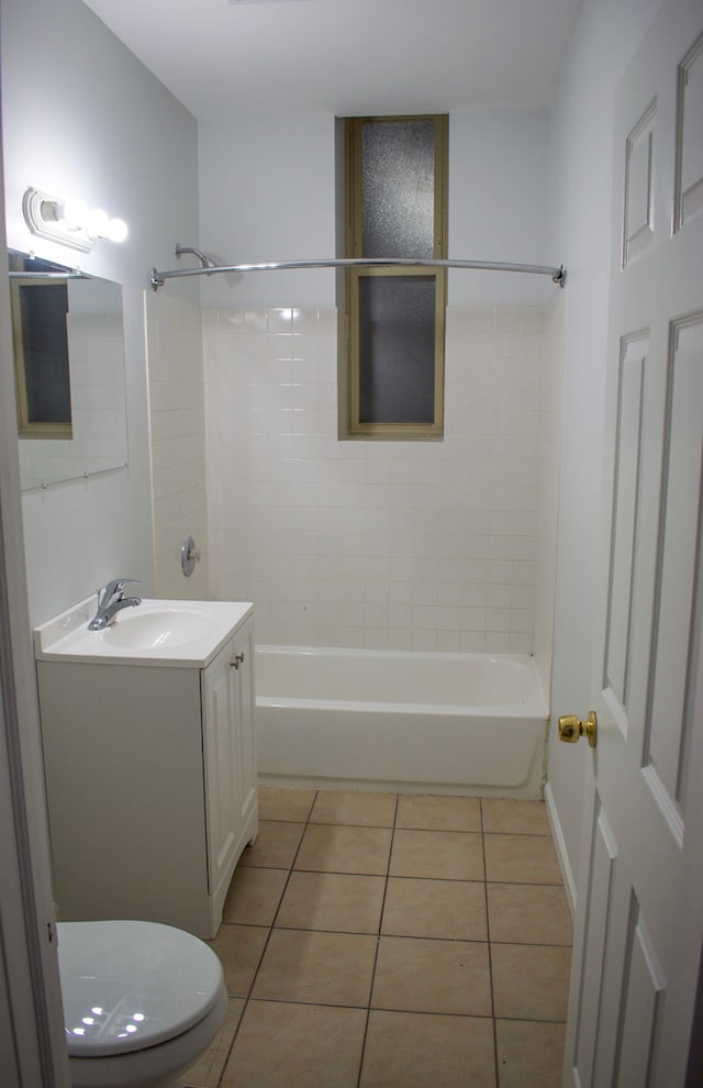 752 E 43rd St Unit 2E, Chicago, IL 60653 - bathroom with vanity, tile patterned flooring, shower / washtub combination, and toilet
