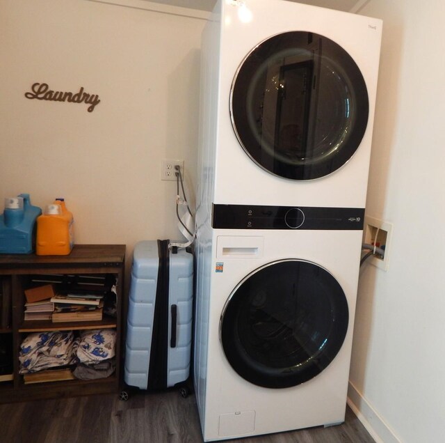 2406 Grape St, Joliet, IL 60435 - washroom with estacked washer and dryer, wood finished floors, and baseboards