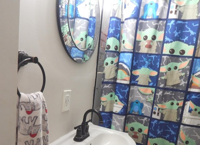 2406 Grape St, Joliet, IL 60435 - full bathroom with a sink and a shower with curtain