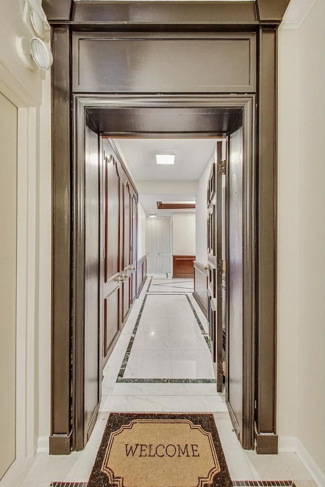 1040 N Lake Shore Dr Unit 7B, Chicago, IL 60611 - hallway featuring inlaid floor details and baseboards