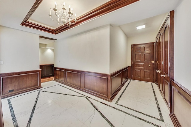 1040 N Lake Shore Dr Unit 7B, Chicago, IL 60611 - hall with a chandelier, wainscoting, and inlaid floor details