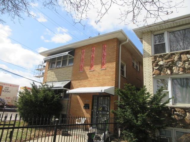 7448 S Maplewood Ave, Chicago, IL 60629 - view of front of house with brick siding