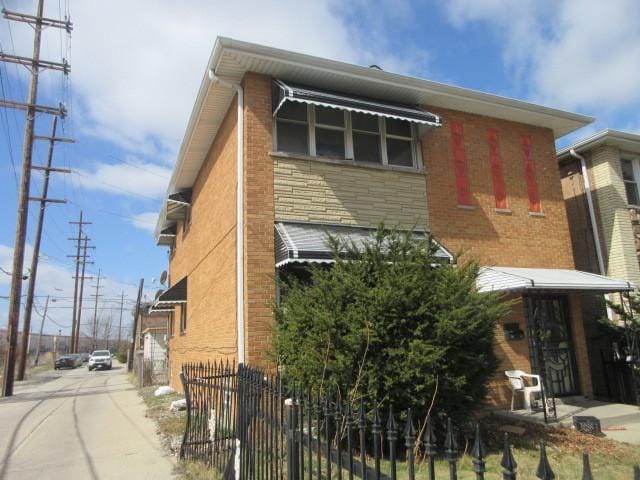 7448 S Maplewood Ave, Chicago, IL 60629 - view of home's exterior with brick siding