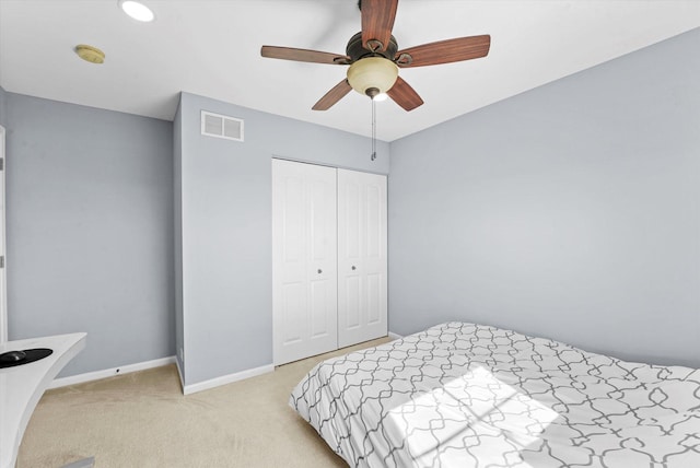 525 Plaza Pl, Aurora, IL 60504 - bedroom featuring a closet, light colored carpet, baseboards, and ceiling fan