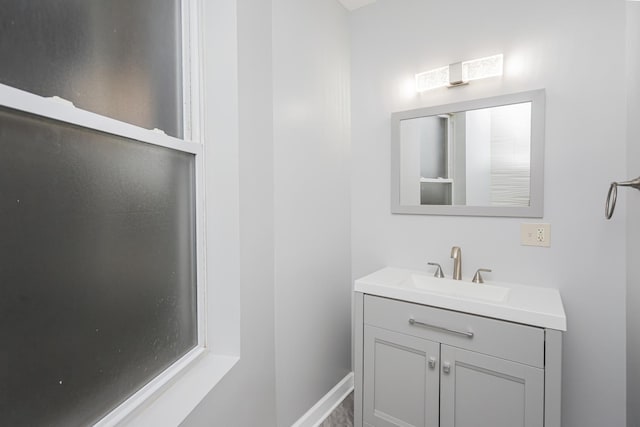 6557 S University Ave Unit 204, Chicago, IL 60637 - bathroom featuring vanity and baseboards