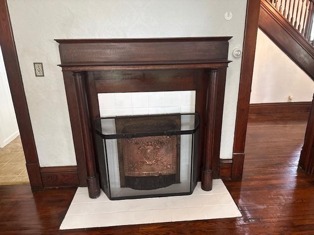 509 N Quincy St, Clinton, IL 61727 - detailed view of wood finished floors and baseboards