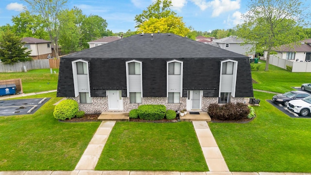 8517 Steven Pl Unit 4, Tinley Park, IL 60477 - view of front of property featuring a shingled roof and brick siding