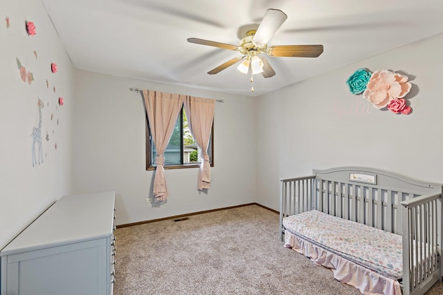 8517 Steven Pl Unit 4, Tinley Park, IL 60477 - carpeted bedroom featuring a nursery area, baseboards, and ceiling fan