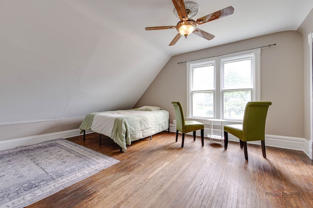 71 S Chestnut St, Aurora, IL 60506 - bedroom with lofted ceiling, wood-type flooring, baseboards, and a ceiling fan