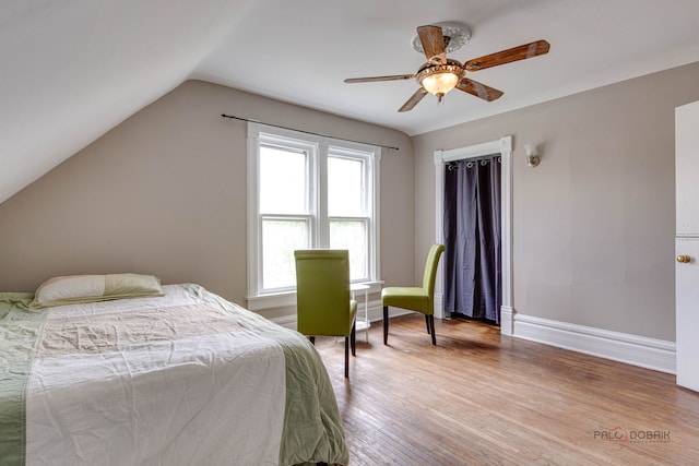 71 S Chestnut St, Aurora, IL 60506 - bedroom featuring lofted ceiling, wood finished floors, baseboards, and a ceiling fan