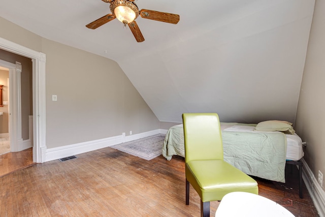 71 S Chestnut St, Aurora, IL 60506 - bedroom featuring lofted ceiling, wood finished floors, ceiling fan, and baseboards