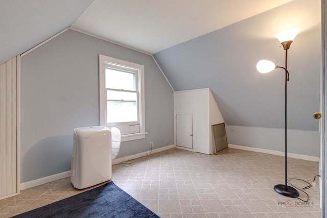 71 S Chestnut St, Aurora, IL 60506 - additional living space with lofted ceiling and baseboards