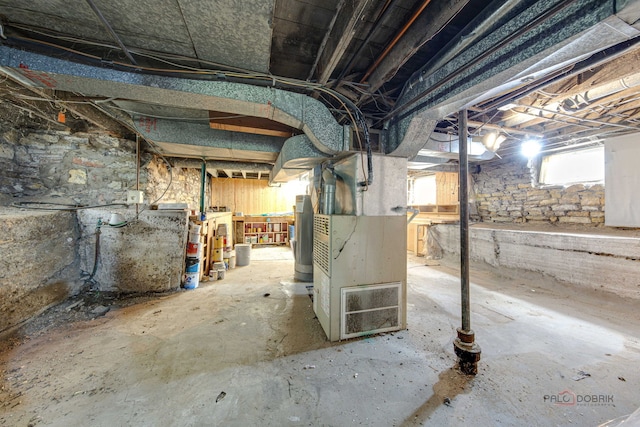 71 S Chestnut St, Aurora, IL 60506 - basement featuring heating unit and healthy amount of natural light