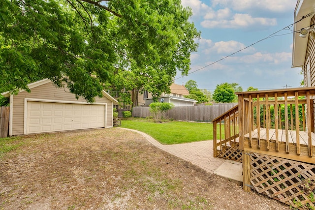 71 S Chestnut St, Aurora, IL 60506 - view of yard with an outbuilding, a garage, and a deck