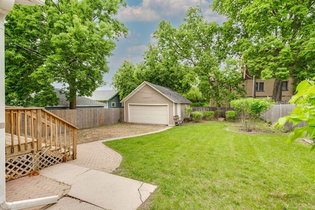 71 S Chestnut St, Aurora, IL 60506 - view of yard featuring a detached garage, an outdoor structure, and a wooden deck