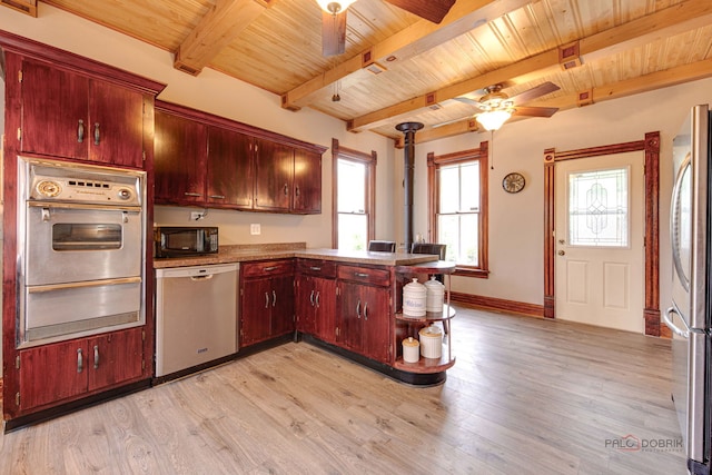 71 S Chestnut St, Aurora, IL 60506 - kitchen with stainless steel appliances, a ceiling fan, a warming drawer, wooden ceiling with exposed beams, and a peninsula