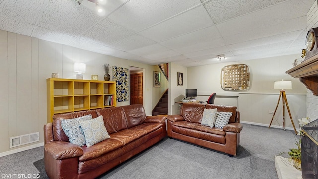 26W029 Hazel Ln, Wheaton, IL 60187 - carpeted living area featuring stairs and a drop ceiling