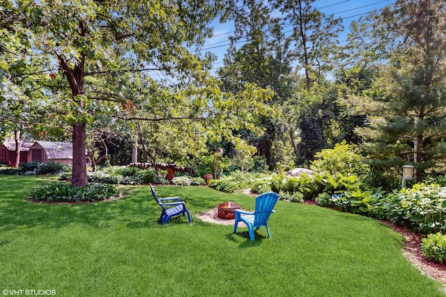 26W029 Hazel Ln, Wheaton, IL 60187 - view of green lawn with a fire pit