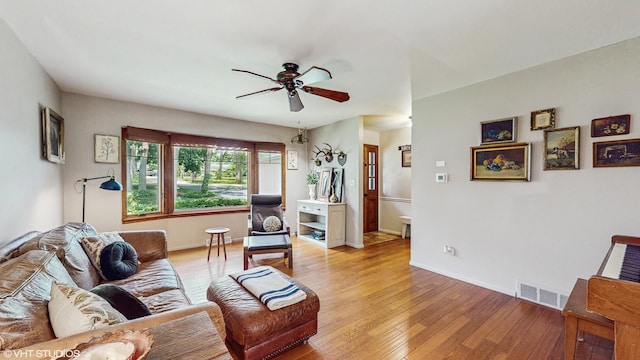 26W029 Hazel Ln, Wheaton, IL 60187 - living room featuring ceiling fan and light wood-style flooring
