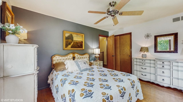 26W029 Hazel Ln, Wheaton, IL 60187 - bedroom featuring wood finished floors, a closet, and a ceiling fan