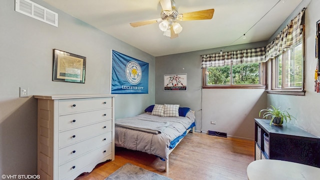 26W029 Hazel Ln, Wheaton, IL 60187 - bedroom featuring light wood-style floors and a ceiling fan
