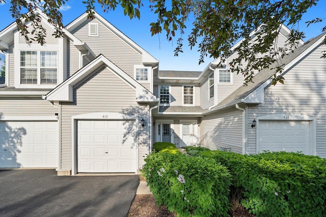 410 Cobblestone Ct, Oswego, IL 60543 - traditional-style home featuring driveway and an attached garage