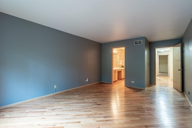 1140 Bristlecone Ct Unit 1140, Darien, IL 60561 - unfurnished room with light wood-style flooring and baseboards