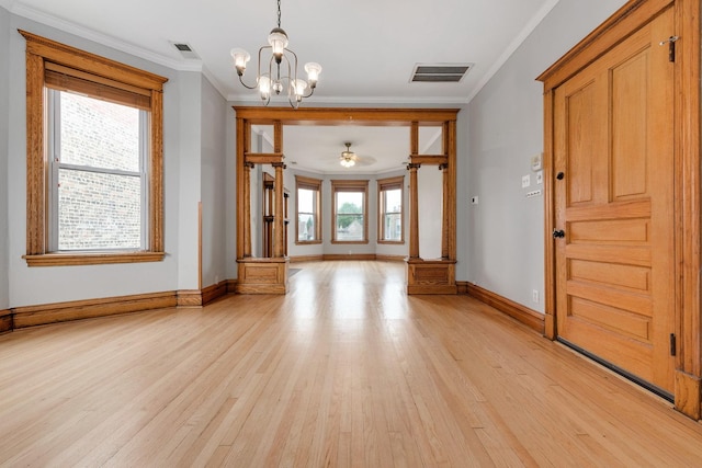 2533 N Kimball Ave, Chicago, IL 60647 - entryway with crown molding, baseboards, light wood-style floors, and a chandelier
