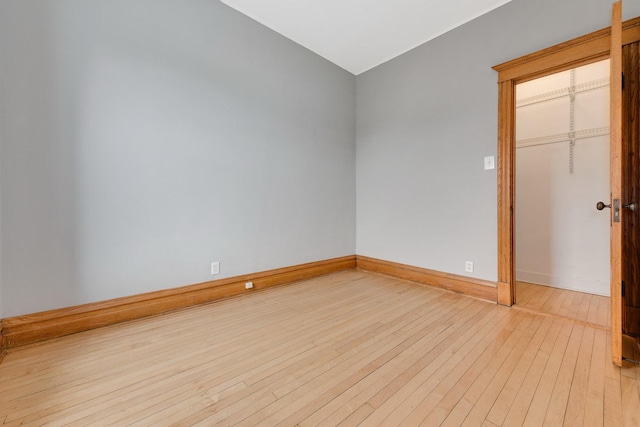2533 N Kimball Ave, Chicago, IL 60647 - spare room with wood-type flooring and baseboards