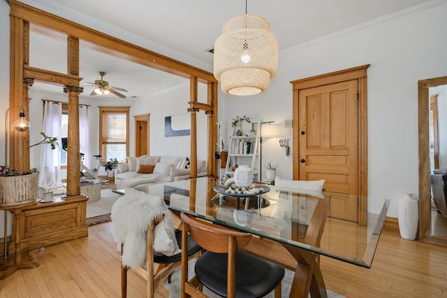 2533 N Kimball Ave, Chicago, IL 60647 - dining room featuring light wood-style floors, ornamental molding, and a ceiling fan
