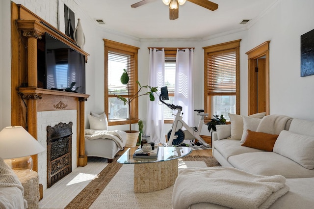 2533 N Kimball Ave, Chicago, IL 60647 - living area with a ceiling fan, a fireplace with flush hearth, and ornamental molding