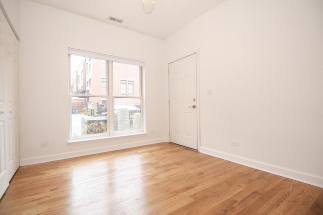 1500 S Halsted St Unit 1B, Chicago, IL 60607 - spare room with light wood finished floors and baseboards