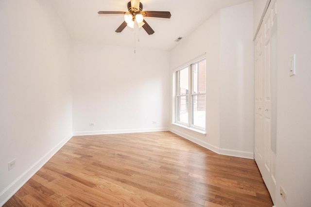 1500 S Halsted St Unit 1B, Chicago, IL 60607 - spare room featuring a ceiling fan, light wood-type flooring, and baseboards