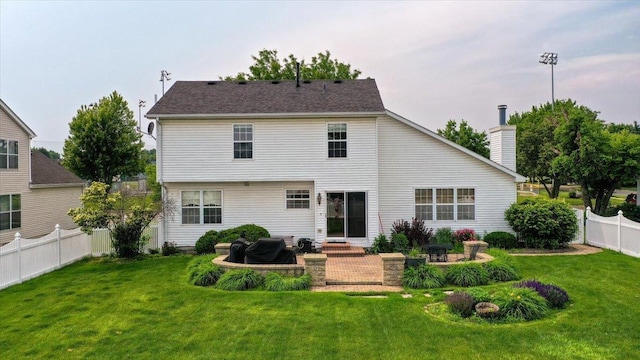 323 Valley Forge Ave, South Elgin, IL 60177 - rear view of house featuring a chimney, a patio, and entry steps