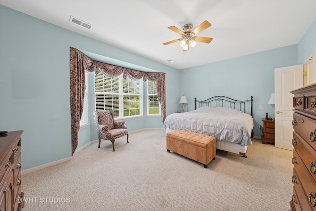 319 Capital Dr, Shorewood, IL 60404 - bedroom with light colored carpet and ceiling fan
