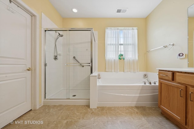 319 Capital Dr, Shorewood, IL 60404 - bathroom with a garden tub, vanity, and a shower stall