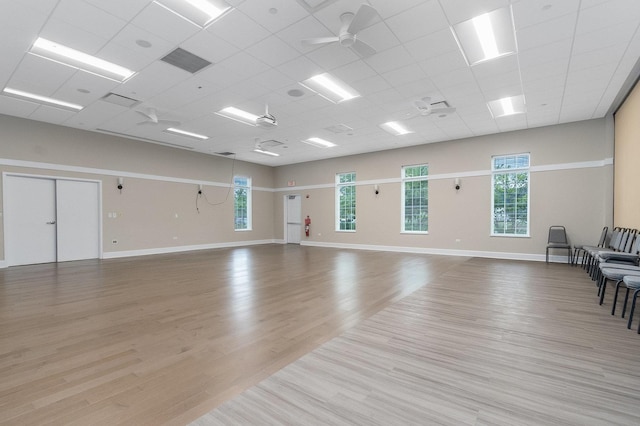 319 Capital Dr, Shorewood, IL 60404 - unfurnished room featuring wood finished floors, a paneled ceiling, and a ceiling fan
