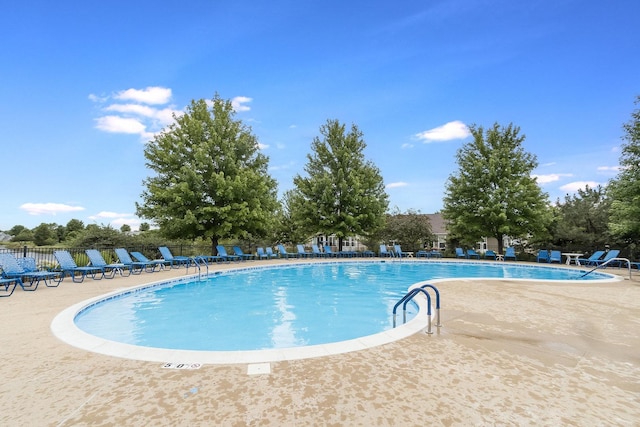 319 Capital Dr, Shorewood, IL 60404 - community pool featuring a patio