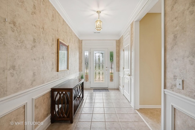 319 Capital Dr, Shorewood, IL 60404 - foyer entrance featuring ornamental molding and light tile patterned flooring
