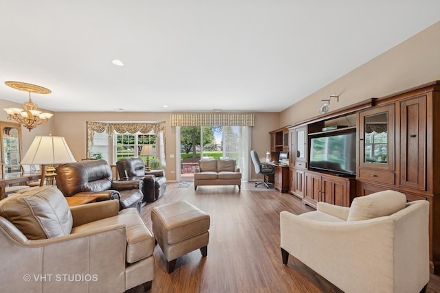 319 Capital Dr, Shorewood, IL 60404 - living room featuring a chandelier, wood finished floors, plenty of natural light, and recessed lighting