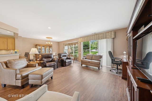 319 Capital Dr, Shorewood, IL 60404 - living area featuring light wood-style flooring, a chandelier, an office area, and recessed lighting